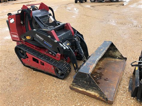 dingo bucket size vs skid steer|toro dingo track loader.